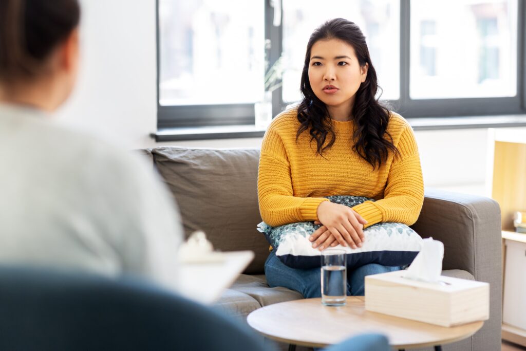 woman speaking to therapist in Harrogate